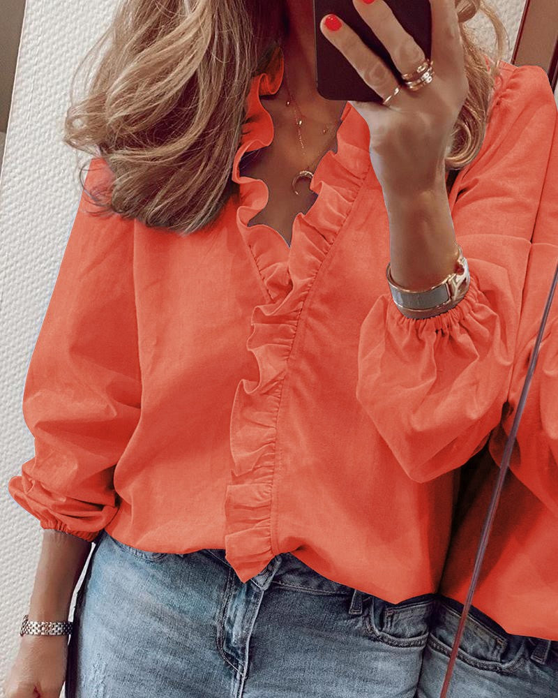 Rozana - Elegante blouse met knoopsluiting en pofmouwen