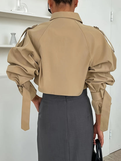 Katya - Gesneden trenchcoat met gespmanchetten voor dames