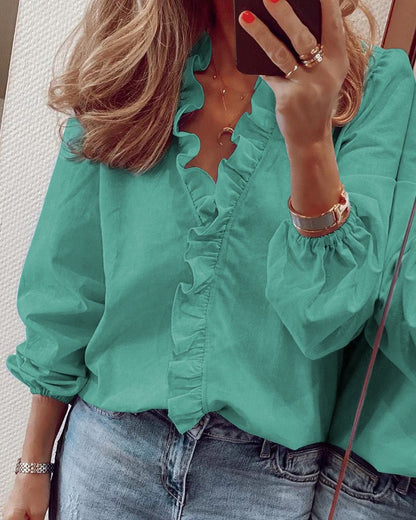 Rozana - Elegante blouse met knoopsluiting en pofmouwen
