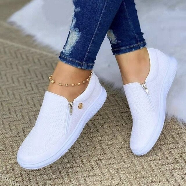 Kornelia - Slip-on sneakers met ademende mesh en rits