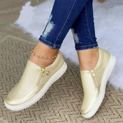 Kornelia - Slip-on sneakers met ademende mesh en rits