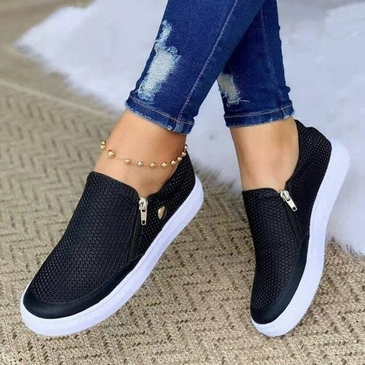 Kornelia - Slip-on sneakers met ademende mesh en rits