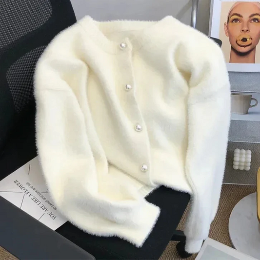 Fran - Zacht gebreid vest met parelmoeren knoopjes